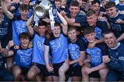 31 May 2023; Dublin captain Cillian Emmett lifts the Murray Cup with teammate Luke O'Boyle, 11, after their side's victory in the 2023 Electric Ireland Leinster GAA Football Minor Championship Final match between Dublin and Kildare at Laois Hire O'Moore Park in Portlaoise, Laois. Photo by Piaras Ó Mídheach/Sportsfile