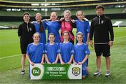 31 May 2023; Scoil Uí Riada, Kilcock, Kildare, back row, from left, Sorcha Ní Ghiolla, Lauren de Búrca, Sorcha Breathnach, Annabelle Nic Ghiolla Fhiondáin, Ailbhe de Faoite and Breandán MacGabhann, with, front row, Ella Ní Bhroin, Caoilfhinn Ní Raghallaigh, Molly Ní Thaillúir and Emma de Creag before the ‘C’ Girls Cup, for large sized schools, at the FAI Primary School 5s National Finals in the Aviva Stadium, Dublin. Photo by Stephen McCarthy/Sportsfile