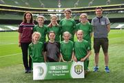 31 May 2023; Castleblakeney NS, Galway, back row, from left, Michelle Walsh, Ciara McGinty, Mairéad Mullins, Dearbhla McDonagh, Kaitlynn Lally and Seámus Diskin, with, front row, Lillian Fleming, Megan Lawlor, Róisín Reynolds and Emma Geraghty before the ‘A’ Girls Cup, for small sized schools, at the FAI Primary School 5s National Finals in the Aviva Stadium, Dublin. Photo by Stephen McCarthy/Sportsfile