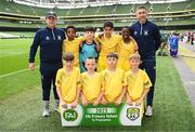 31 May 2023; Scoil Cholmcille, Letterkenny, Donegal, back row, from left, Odhrán McGowan, Helder Carvalho, Lee Hegarty, Sean Gallagher, Kurt Obanor and Rory Kavanagh, with, front row, Cayden Crossan, Martin Ward, Cristian Evangelista and Oran Daly before the ‘C’ Cup, for mixed large sized schools, at the FAI Primary School 5s National Finals in the Aviva Stadium, Dublin. Photo by Stephen McCarthy/Sportsfile