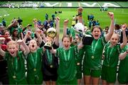 31 May 2023; Castleblakeney NS, Galway, captian Mairéad Mullins and team-mates celebrate winning the ‘A’ Girls Cup, for small sized schools, at the FAI Primary School 5s National Finals in the Aviva Stadium, Dublin. Photo by Stephen McCarthy/Sportsfile