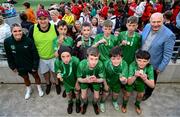 31 May 2023; Republic of Ireland's Jamie Finn and FAI President Gerry McAnaney with St Mary’s NS, Mountbellew, Galway, after the ‘A’ Cup, for mixed small sized schools, at the FAI Primary School 5s National Finals in the Aviva Stadium, Dublin. Photo by Stephen McCarthy/Sportsfile