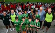31 May 2023; Republic of Ireland's Jamie Finn and FAI President Gerry McAnaney with St John the Apostle, Knocknacarra, Galway, after the ‘B’ Cup, for mixed medium sized schools, at the FAI Primary School 5s National Finals in the Aviva Stadium, Dublin. Photo by Stephen McCarthy/Sportsfile
