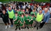 31 May 2023; Republic of Ireland's Jamie Finn and FAI President Gerry McAnaney with Castlebar Primary School, Mayo, after the ‘C’ Cup, for mixed large sized schools, at the FAI Primary School 5s National Finals in the Aviva Stadium, Dublin. Photo by Stephen McCarthy/Sportsfile