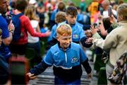 31 May 2023; Páidí Connolly of St Joseph’s NS, Hacketstown, Carlow, leads his team to collect the ‘A’ Cup, for mixed small sized schools, at the FAI Primary School 5s National Finals in the Aviva Stadium, Dublin. Photo by Stephen McCarthy/Sportsfile
