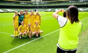 31 May 2023; Coach Danielle Fay takes a photograph of the St Patrick’s NS, Lurgybrack, Donegal team before the ‘B’ Girls Cup, for medium sized schools, at the FAI Primary School 5s National Finals in the Aviva Stadium, Dublin. Photo by Stephen McCarthy/Sportsfile