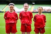 31 May 2023; Scoil an Spioraid Naoimh, Roxborough, Limerick, players, from left, Aoife Grant, Caoimhe Curren and Sophie Gleeson during the ‘B’ Girls Cup, for medium sized schools, at the FAI Primary School 5s National Finals in the Aviva Stadium, Dublin. Photo by Stephen McCarthy/Sportsfile