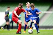 31 May 2023; Kswawery Kita of Scoil Eoin, Crumlin, Dublin, right, in action against Elliot Maxwell of St Anne’s School, Ennis, Clare, during the Special Schools Cup at the FAI Primary School 5s National Finals in the Aviva Stadium, Dublin. Photo by Stephen McCarthy/Sportsfile