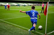 31 May 2023; Kswawery Kita of Scoil Eoin, Crumlin, Dublin, takes a corner during the Special Schools Cup at the FAI Primary School 5s National Finals in the Aviva Stadium, Dublin. Photo by Stephen McCarthy/Sportsfile