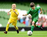31 May 2023; Cian Higgins of St Columba’s NS, Ballybrack, Cork, right, in action against Eoin Hirrell of Scoil Íosagáin, Buncrana, Donegal, during the Special Schools Cup at the FAI Primary School 5s National Finals in the Aviva Stadium, Dublin. Photo by Stephen McCarthy/Sportsfile