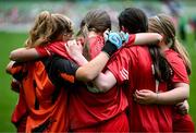 31 May 2023; Gaelscoil Charraig Uí Leighin, Cork, players huddle during the ‘C’ Girls Cup, for large sized schools, at the FAI Primary School 5s National Finals in the Aviva Stadium, Dublin. Photo by Stephen McCarthy/Sportsfile