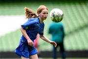31 May 2023; Aine Deacon of Scoil Naomh Peadar S’Pol, Ballon, Carlow, during the ‘B’ Girls Cup, for medium sized schools, at the FAI Primary School 5s National Finals in the Aviva Stadium, Dublin. Photo by Stephen McCarthy/Sportsfile