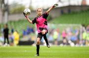 31 May 2023; Lucy Malone of Scoil Naomh Peadar S’Pol, Ballon, Carlow, during the ‘B’ Girls Cup, for medium sized schools, at the FAI Primary School 5s National Finals in the Aviva Stadium, Dublin. Photo by Stephen McCarthy/Sportsfile