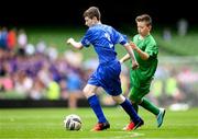 31 May 2023; Kairon Wynne of Scoil Eoin, Crumlin, Dublin, in action against Gearóid Cunningham of St Columba’s NS, Ballybrack, Cork, right, during the Special Schools Cup at the FAI Primary School 5s National Finals in the Aviva Stadium, Dublin. Photo by Stephen McCarthy/Sportsfile
