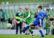 31 May 2023; Patrick Lohan of St Mary’s NS, Mountbellew, Galway, in action against Oisín Wall of St Joseph’s NS, Hacketstown, Carlow, right, during the ‘A’ Cup, for mixed small sized schools, at the FAI Primary School 5s National Finals in the Aviva Stadium, Dublin. Photo by Stephen McCarthy/Sportsfile