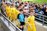 31 May 2023; St Eunan’s NS, Raphoe, Donegal, players make their way to collect the ‘B’ Cup, for mixed medium sized schools, at the FAI Primary School 5s National Finals in the Aviva Stadium, Dublin. Photo by Stephen McCarthy/Sportsfile