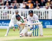 1 June 2023; Paul Stirling of Ireland top edges the ball on to his arm which is subsequently caught by wicketkeeper Jonny Bairstow of England during day one of the Test Match between England and Ireland at Lords Cricket Ground in London, England. Photo by Matt Impey/Sportsfile