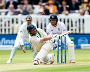 1 June 2023; Paul Stirling of Ireland top edges the ball on to his arm which is subsequently caught by wicketkeeper Jonny Bairstow of England during day one of the Test Match between England and Ireland at Lords Cricket Ground in London, England. Photo by Matt Impey/Sportsfile