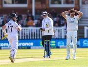 1 June 2023; Fionn Hand of Ireland, right, reacts after being hit for four runs by Ben Duckett of England during day one of the Test Match between England and Ireland at Lords Cricket Ground in London, England. Photo by Matt Impey/Sportsfile