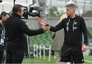 20 May 2023; La Rochelle head coach Ronan O'Gara, right, meets former England intrnational and BT Sport pundit Austin Healey after the Heineken Champions Cup Final match between Leinster and La Rochelle at Aviva Stadium in Dublin. Photo by Brendan Moran/Sportsfile