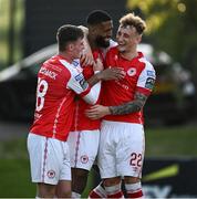 2 June 2023; Noah Lewis of St Patrick's Athletic, centre, celebrates with teammates Ben McCormack and Sam Curtis after scoring his side's second goal during the SSE Airtricity Men's Premier Division match between UCD and St Patrick's Athletic at UCD Bowl in Dublin. Photo by Harry Murphy/Sportsfile
