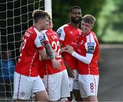 2 June 2023; Noah Lewis of St Patrick's Athletic, second right, celebrates with teammates including Chris Forrester after scoring his side's second goal during the SSE Airtricity Men's Premier Division match between UCD and St Patrick's Athletic at UCD Bowl in Dublin. Photo by Harry Murphy/Sportsfile