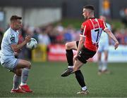 2 June 2023; Michael Duffy of Derry City in action against John Ross Wilson of Shelbourne during the SSE Airtricity Men's Premier Division match between Derry City and Shelbourne at The Ryan McBride Brandywell Stadium in Derry. Photo by Brendan Moran/Sportsfile