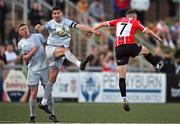 2 June 2023; Kameron Ledwidge, left, and Mark Coyle of Shelbourne in action against Michael Duffy of Derry City during the SSE Airtricity Men's Premier Division match between Derry City and Shelbourne at The Ryan McBride Brandywell Stadium in Derry. Photo by Brendan Moran/Sportsfile