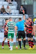 2 June 2023; Ronan Finn of Shamrock Rovers, hidden, is shown a red card by referee Paul McLaughlin during the SSE Airtricity Men's Premier Division match between Shamrock Rovers and Dundalk at Tallaght Stadium in Dublin. Photo by Stephen McCarthy/Sportsfile