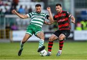 2 June 2023; Roberto Lopes of Shamrock Rovers in action against Patrick Hoban of Dundalk during the SSE Airtricity Men's Premier Division match between Shamrock Rovers and Dundalk at Tallaght Stadium in Dublin. Photo by Stephen McCarthy/Sportsfile