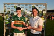 2 June 2023; Ben Murphy of Kerry is presented with the Electric Ireland Player of the Match award by TG4 analyst and former Cork footballer Paddy Kelly following his performance in the 2023 Electric Ireland Munster GAA Football Minor Championship Final match between Cork and Kerry at Austin Stack Park in Kerry. Photo by Eóin Noonan/Sportsfile
