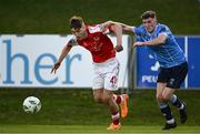 2 June 2023; Mason Melia  of St Patrick's Athletic in action against Michael Gallagher of UCD during the SSE Airtricity Men's Premier Division match between UCD and St Patrick's Athletic at UCD Bowl in Dublin. Photo by Harry Murphy/Sportsfile