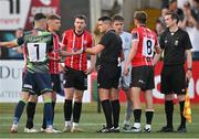 2 June 2023; Derry City players appeal to referee Rob Hennessy for time to take a second corner kick at the end of the SSE Airtricity Men's Premier Division match between Derry City and Shelbourne at The Ryan McBride Brandywell Stadium in Derry. Photo by Brendan Moran/Sportsfile