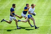 3 June 2023; Brian Lynch of Waterford in action against Luke Boland of Tipperary during the Tailteann Cup Round 3 match between Tipperary and Waterford at Páirc Ui Chaoimh in Cork. Photo by Eóin Noonan/Sportsfile