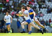 3 June 2023; Michael Curry of Waterford is tackled by Conall Kennedy of Tipperary during the Tailteann Cup Round 3 match between Tipperary and Waterford at Páirc Ui Chaoimh in Cork. Photo by Eóin Noonan/Sportsfile