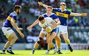 3 June 2023; Jason Gleeson of Waterford in action against Luke Boland of Tipperary during the Tailteann Cup Round 3 match between Tipperary and Waterford at Páirc Ui Chaoimh in Cork. Photo by Eóin Noonan/Sportsfile