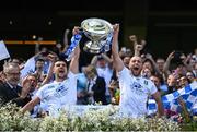 3 June 2023; Monaghan joint captains Niall Garland, left, and Kevin Crawley lift the Lory Meagher cup after their side's victory in the Lory Meagher Cup Final match between Monaghan and Lancashire at Croke Park in Dublin. Photo by Harry Murphy/Sportsfile
