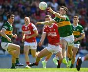 3 June 2023; Maurice Shanley of Cork is tackled by Paudie Clifford of Kerry during the GAA Football All-Ireland Senior Championship Round 2 match between Cork and Kerry at Páirc Ui Chaoimh in Cork. Photo by Eóin Noonan/Sportsfile