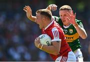 3 June 2023; Brian Hurley of Cork is tackled by Jason Foley of Kerry during the GAA Football All-Ireland Senior Championship Round 2 match between Cork and Kerry at Páirc Ui Chaoimh in Cork. Photo by Eóin Noonan/Sportsfile