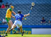 3 June 2023; Liam Mc Kinney of Donegal shoots to score his side's second goal despite the attention of Ben Kearney of Wicklow during the Nickey Rackard Cup Final match between Donegal and Wicklow at Croke Park in Dublin. Photo by Harry Murphy/Sportsfile