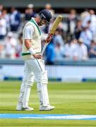 3 June 2023; Mark Adair of Ireland raises his bat after being dismissed for 88 during day three of the Test Match between England and Ireland at Lords Cricket Ground in London, England. Photo by Matt Impey/Sportsfile