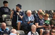 3 June 2023; Former Taoiseach Bertie Ahern reads the match programme before the GAA Football All-Ireland Senior Championship Round 2 match between Kildare and Dublin at UPMC Nowlan Park in Kilkenny. Photo by Piaras Ó Mídheach/Sportsfile