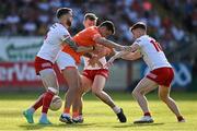 3 June 2023; Stefan Campbell of Armagh is dispossessed by Tyrone players, from left, Ronan McNamee, Michael O’Neill and Conor Meyler during the GAA Football All-Ireland Senior Championship Round 2 match between Tyrone and Armagh at O'Neill's Healy Park in Omagh, Tyrone. Photo by Brendan Moran/Sportsfile