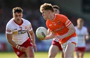 3 June 2023; Conor Turbitt of Armagh in action against Michael McKernan of Tyrone during the GAA Football All-Ireland Senior Championship Round 2 match between Tyrone and Armagh at O'Neill's Healy Park in Omagh, Tyrone. Photo by Brendan Moran/Sportsfile