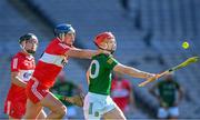 3 June 2023; Adam Gannon of Meath in action against Meehaul McGrath of Derry during the Christy Ring Cup Final match between Derry and Meath at Croke Park in Dublin. Photo by Harry Murphy/Sportsfile