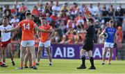 3 June 2023; Referee Martin McNally shows a red card to Rian O'Neill of Armagh during the GAA Football All-Ireland Senior Championship Round 2 match between Tyrone and Armagh at O'Neill's Healy Park in Omagh, Tyrone. Photo by Brendan Moran/Sportsfile