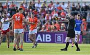 3 June 2023; Referee Martin McNally shows a red card to Rian O'Neill of Armagh during the GAA Football All-Ireland Senior Championship Round 2 match between Tyrone and Armagh at O'Neill's Healy Park in Omagh, Tyrone. Photo by Brendan Moran/Sportsfile