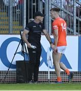 3 June 2023; Rian O'Neill of Armagh walks past manager Kieran McGeeney after being shown a red card during the GAA Football All-Ireland Senior Championship Round 2 match between Tyrone and Armagh at O'Neill's Healy Park in Omagh, Tyrone. Photo by Brendan Moran/Sportsfile