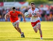 3 June 2023; Matthew Donnelly of Tyrone in action against Conor O'Neill of Armagh during the GAA Football All-Ireland Senior Championship Round 2 match between Tyrone and Armagh at O'Neill's Healy Park in Omagh, Tyrone. Photo by Brendan Moran/Sportsfile