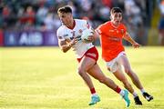 3 June 2023; Michael McKernan of Tyrone in action against Rory Grugan of Armagh during the GAA Football All-Ireland Senior Championship Round 2 match between Tyrone and Armagh at O'Neill's Healy Park in Omagh, Tyrone. Photo by Brendan Moran/Sportsfile